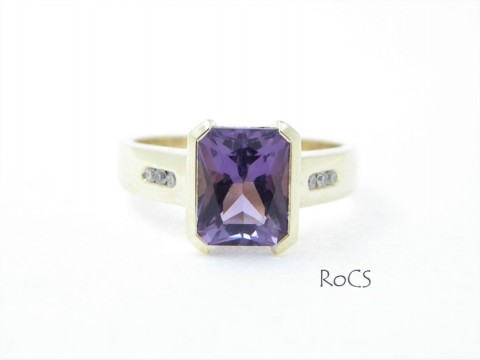 Custom cut amethyst with diamond set shoulders image