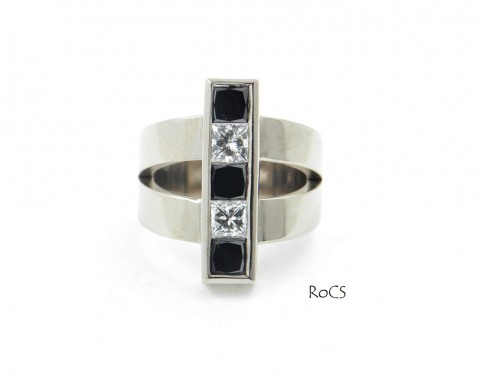 Contemporary black and white diamond set ring image