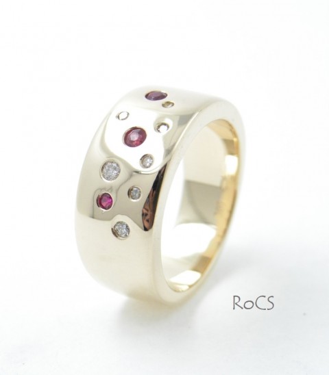 Punch set ruby and diamond ring image