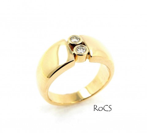 Wide gold band with rub set diamonds image