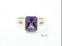 Custom cut amethyst with diamond set shoulders image