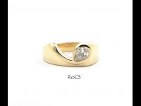 Pear cut diamond set in Koru style band image