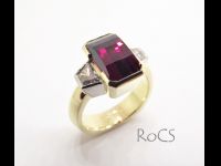 Custom cut rhodolite with trapezoid diamonds image