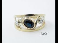 Koru inspired sapphire & diamond ring image