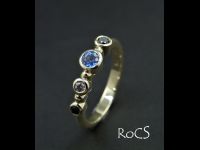 Sapphire and diamond rub set band image